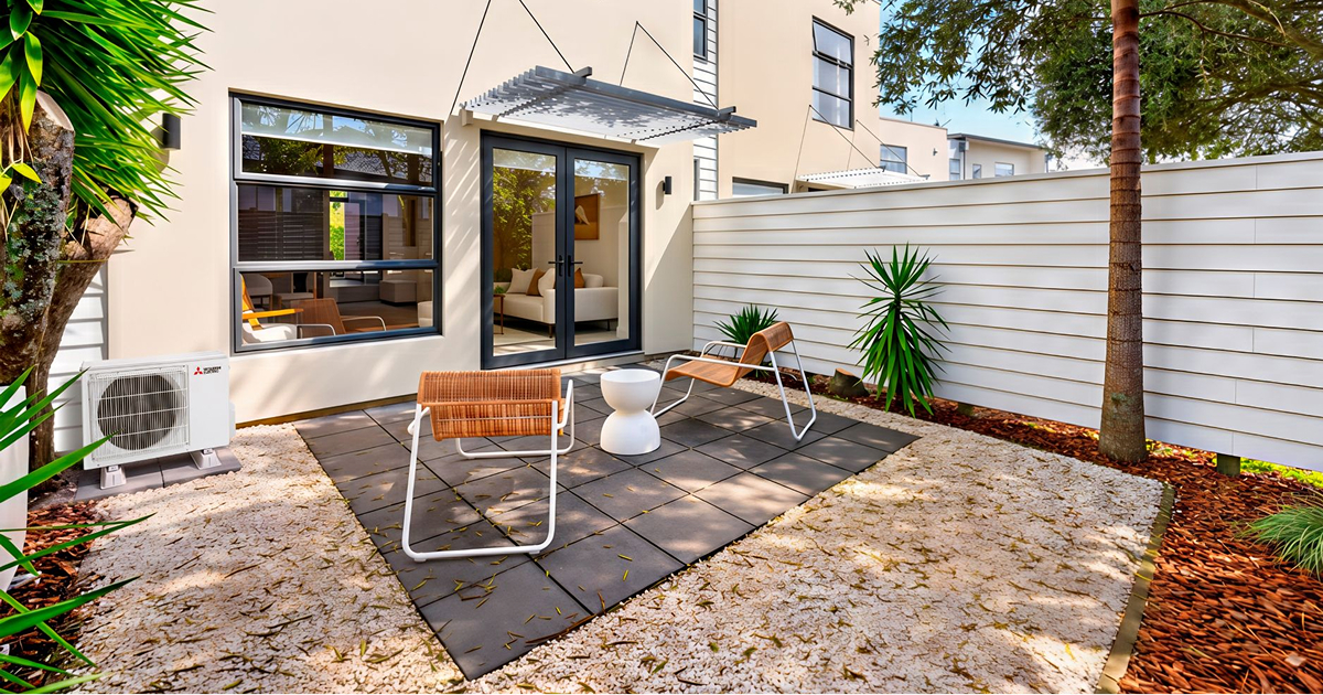 Compact OmniCore 2 Port outdoor unit on a modern deck