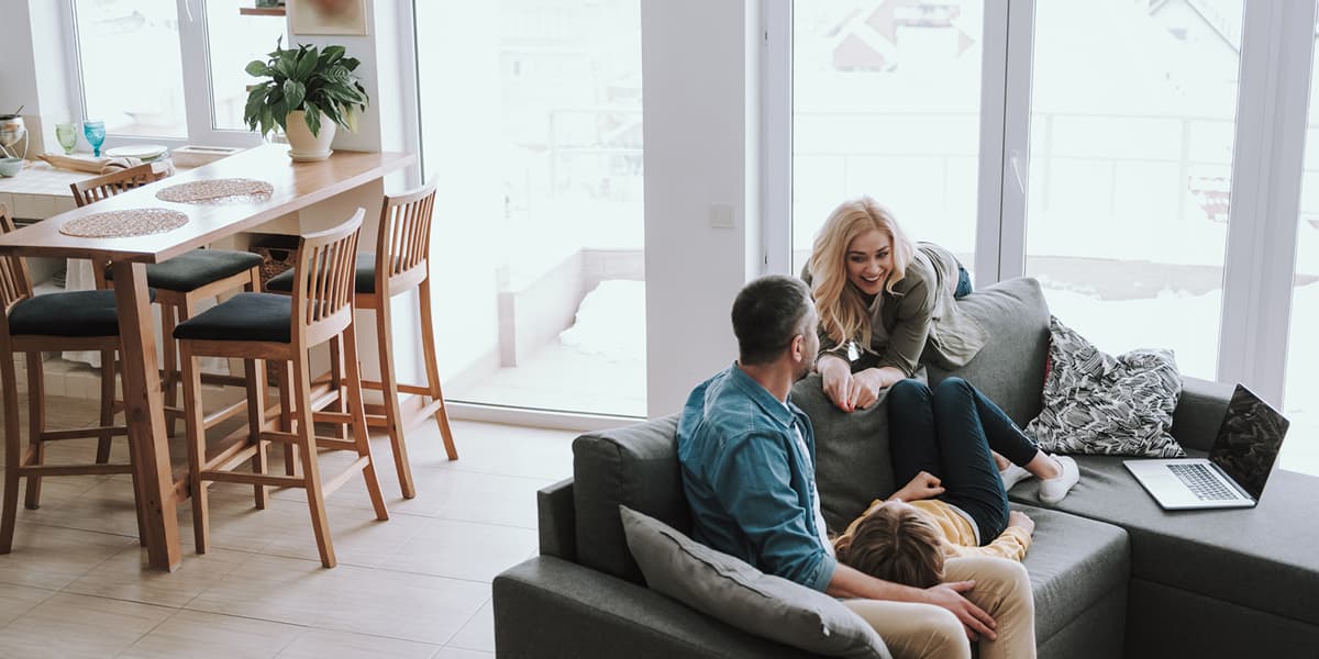 Family enjoying comfortable home with AireTile Slim